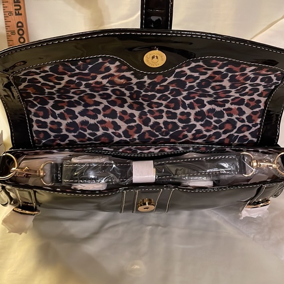 Black brand new MAXX NEW YORK purse. Never used no rips, tears or damage. 14 x 7 - Picture 8 of 11